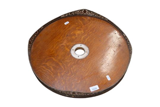 An Edwardian oak tea tray, with a pierced silver plate and copper shaped gallery, diameter 47.5cm - Image 1 of 2