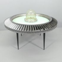 A unique handmade UFO design circular table. 110x82cm. Frame made from a jet fan. Central glass dome