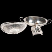 An Elkington & Company silver plated swing-handled fruit basket, and silver plate on copper table