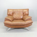 A mid-century design post modern lounge chair in the manner of Nicolletti Salotti, upholstered in