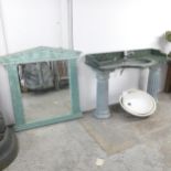 A large architectural marble topped sink, raised on two ceramic columns, and a large Grecian