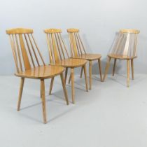 A set of four mid-century beech and elm ply stickback dining chairs by ZPM Radomsko, Poland, stamped