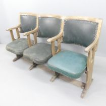 A vintage oak and faux-leather upholstered cinema seat. Overall 157x91x62cm. All three seats have