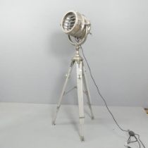 A chrome spotlight floor lamp on adjustable tripod base. Height as pictured 153cm.