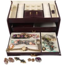 A quantity of costume jewellery, including a silver marcasite floral spray brooch, clip-on earrings,