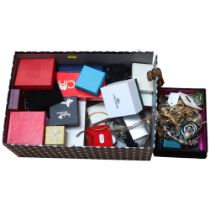 A large quantity of boxed and loose modern costume jewellery, necklaces, bangles, earrings, etc