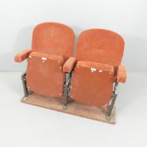 A vintage upholstered double cinema seat. Dimensions (folded) 110x83x28cm