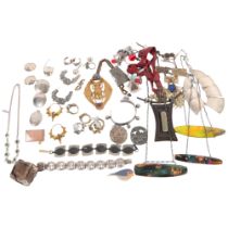 A quantity of mixed costume jewellery, including a "Titanic" bronze panel, necklace, a quantity of