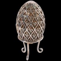 THE ST JAMES'S HOUSE COLLECTION - a modern silver-gilt limited edition Easter egg, with open pierced