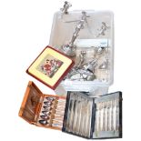 A silver plated 3-branch table candelabra, cased cutlery, egg cups on stand, etc
