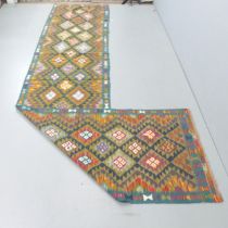 A Maimana Kilim runner. 399x90cm.