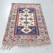 A cream-ground Persian rug. 162x116cm.