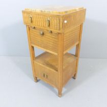 A French Art Deco oak and ash pot cupboard, with marble top and brass mounts. 40x82x38cm.
