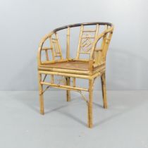 A Chinese bamboo child's chair. Overall 43x50x36cm, seat 31x32x26cm.