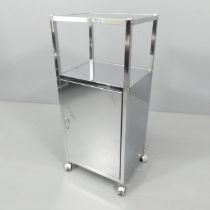 A vintage polished metal bathroom / styling cabinet. 40x90x32cm.