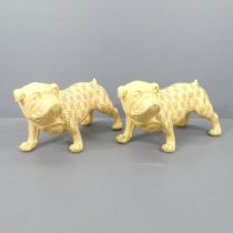 A pair of large ceramic bull dogs, decorated with the Gucci logo. 73x40x33cm. One has crack to front