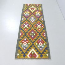 A Maimana Kilim runner. 189x68cm.