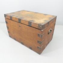 An antique oak metal-bound silver chest, with tray fitted interior. Plaque to top inscribed KVB.