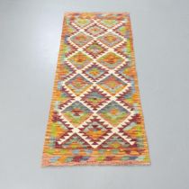 A Chobi Kilim runner. 146x64cm.