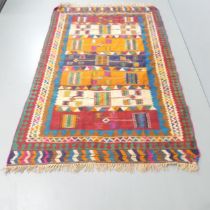 A large Kilim rug. 235x153cm.