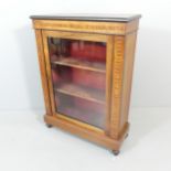 A Victorian walnut and satinwood strung pier cabinet, with ebonised and inlaid rosewood