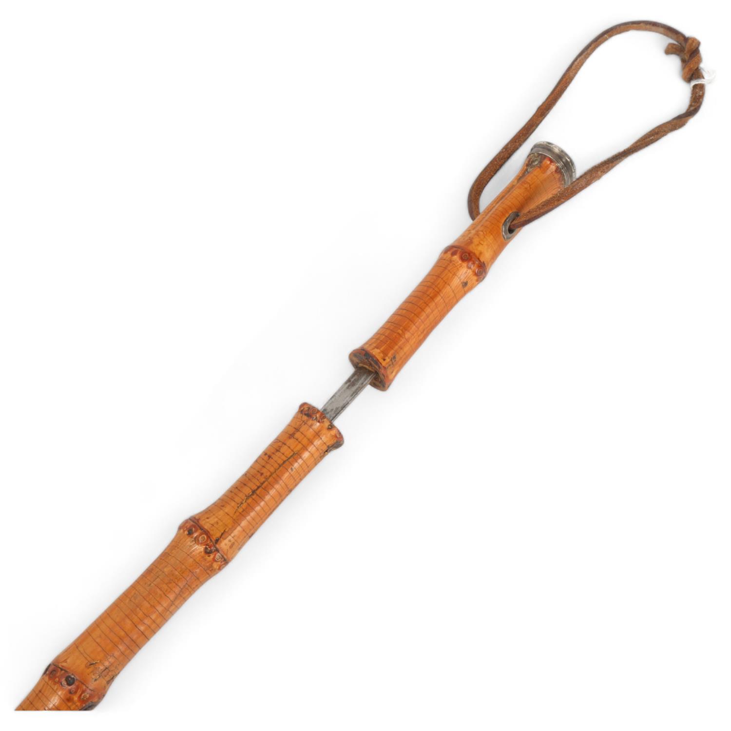 Victorian bamboo sword stick, triangular section blade, hilt having unmarked white metal cap,