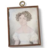 Early 19th century miniature watercolour on ivory, portrait of a young woman, unsigned, in brass