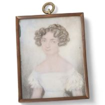 Early 19th century miniature watercolour on ivory, portrait of a young woman, unsigned, in brass