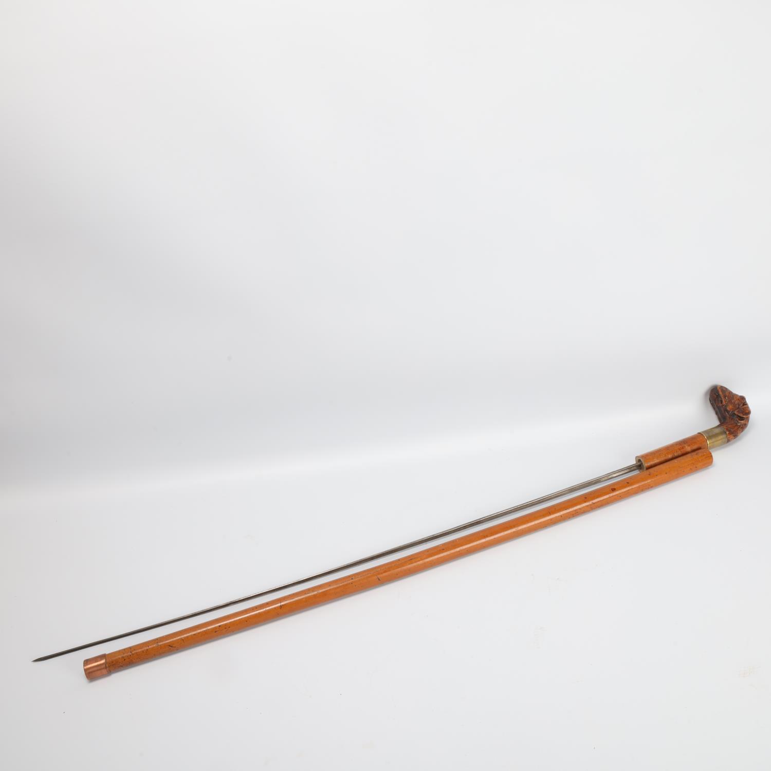 19th century Malacca sword stick with carved wood dog's head handle, blade length 77cm Handle - Image 3 of 3