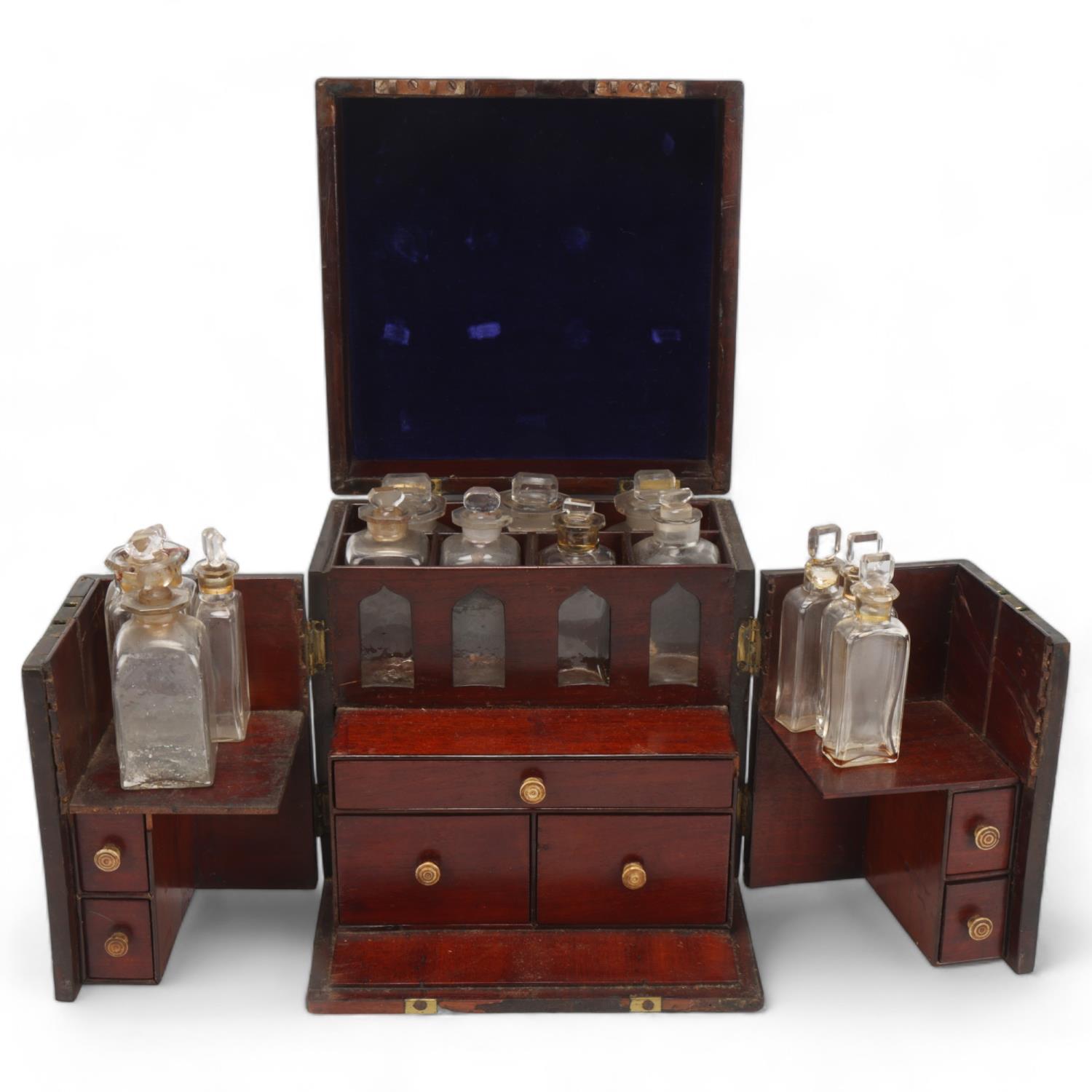 A 19th century brass-bound mahogany travelling apothecary cabinet, with hinged lid and doors opening