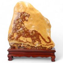 Abstract marble/stone sculpture depicting a tiger, on hardwood stand, overall height 55cm