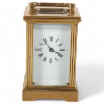 Miniature French brass-cased carriage clock, height 8.5cm Good condition and in working order