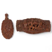 A 19th century coquilla nut box, relief carved and pierced figural decoration, length 8.5cm,