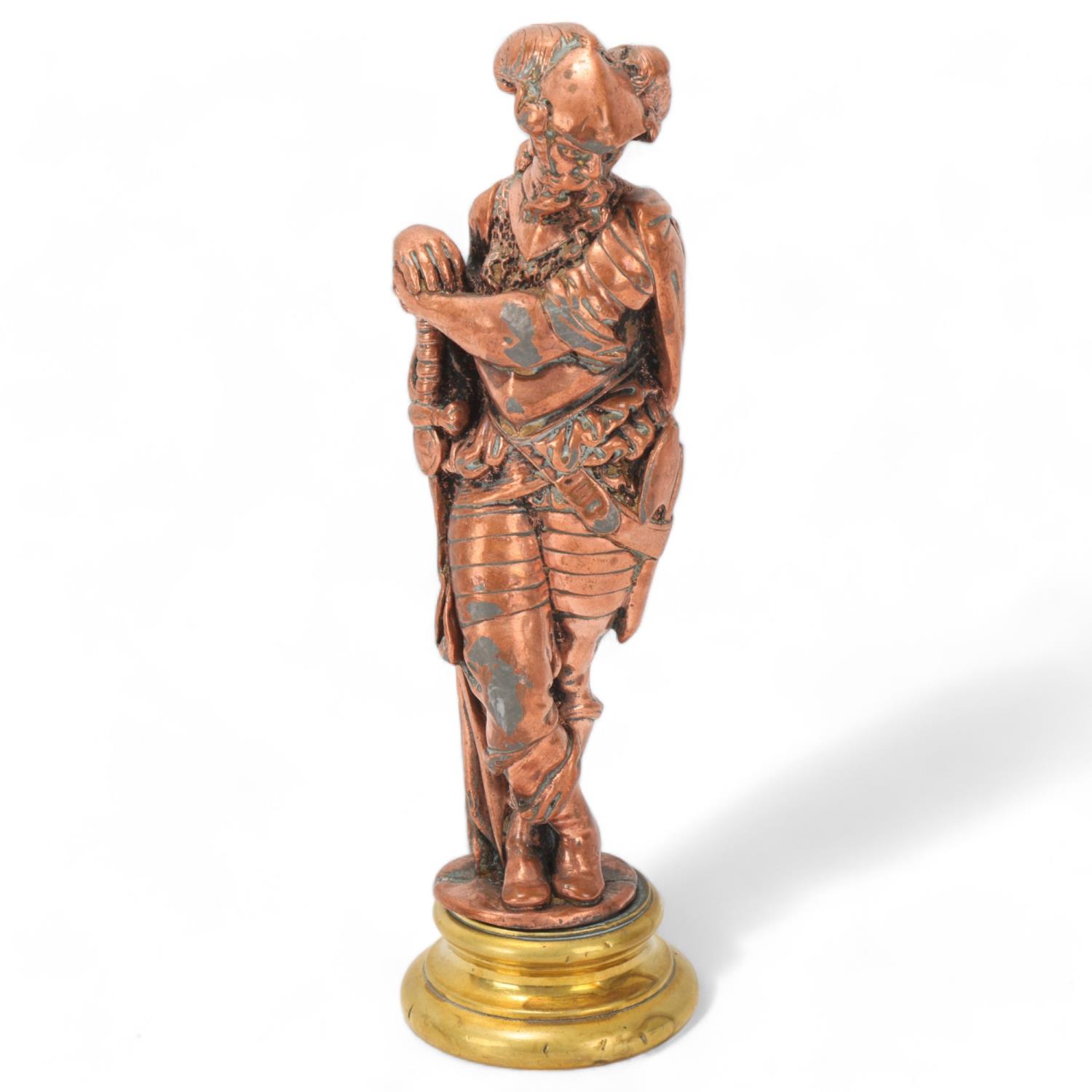 A 19th century copper on solid cast lead figure of a knight, on cast-brass base, unsigned, height