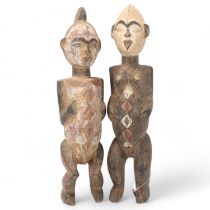 Buna pair of Tribal carved wood figures, height 39cm