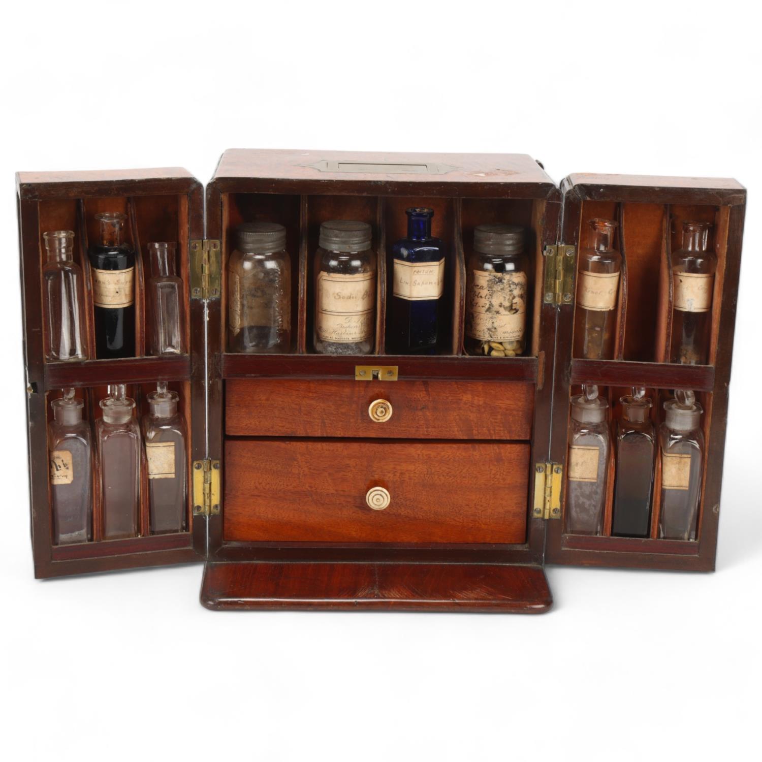 A 19th century mahogany apothecary box, recessed brass carrying handle, and fitted interior with 2