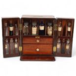 A 19th century mahogany apothecary box, recessed brass carrying handle, and fitted interior with 2