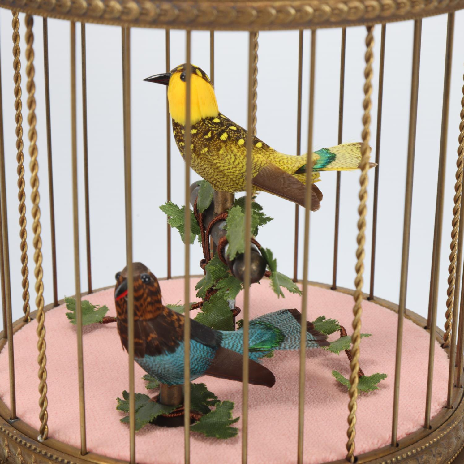 Reuge Music, bird in a cage automaton, brass cage with musical mechanism, height 28cm, with wooden - Image 2 of 3