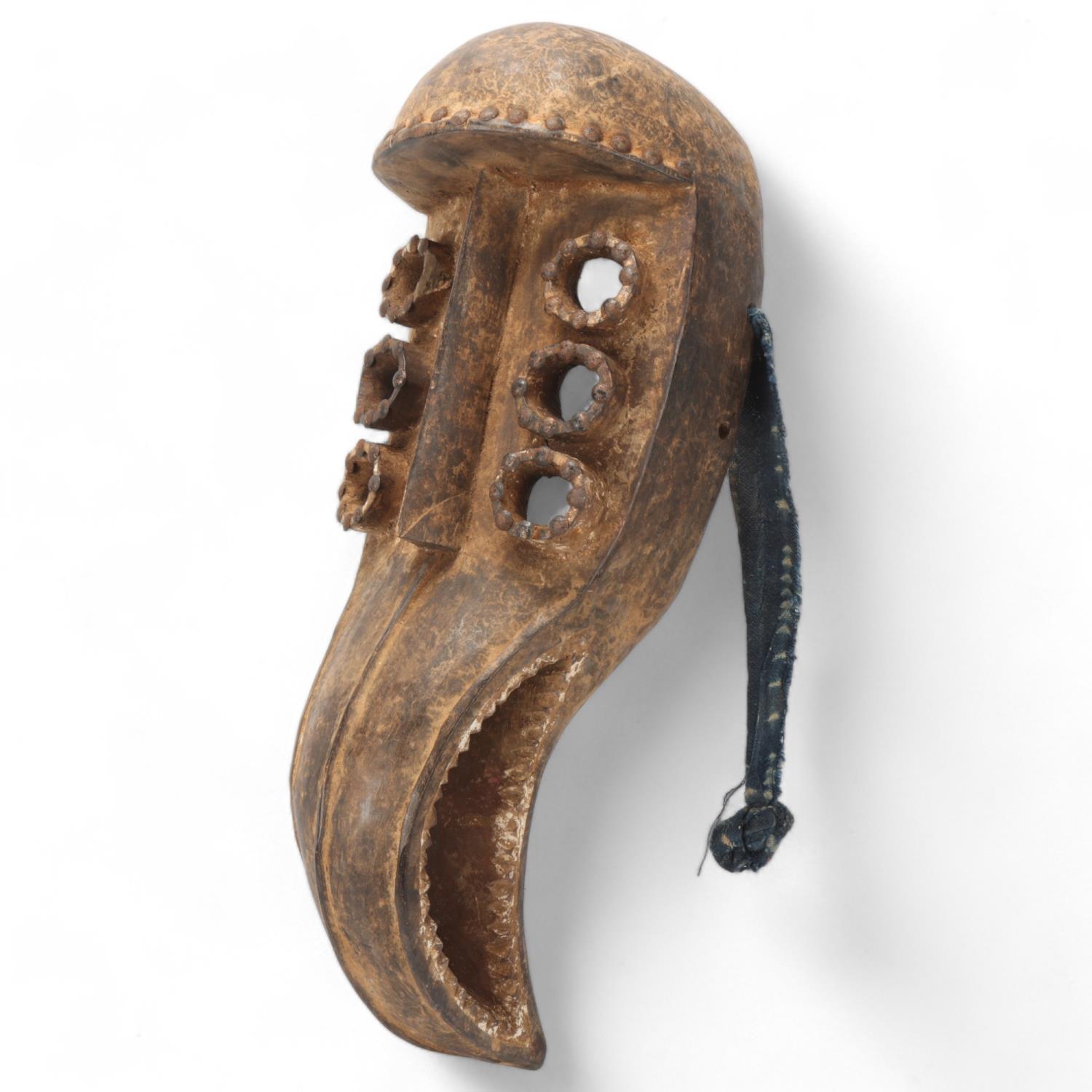 African Grebo carved wood beak mask, Liberia, length 46cm