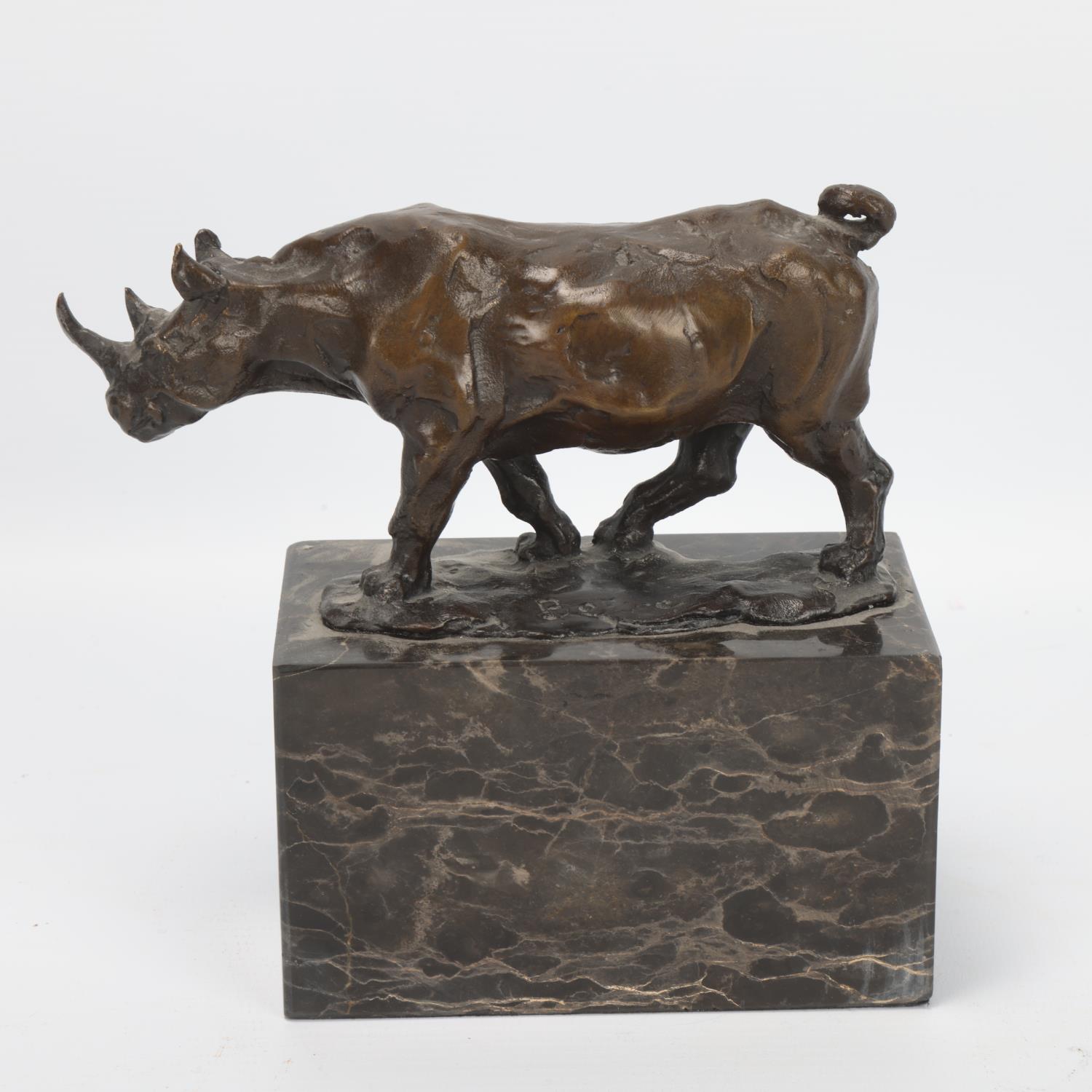 Contemporary bronze rhino sculpture, on marble block base, indistinctly signed, rhino length 15.5cm, - Image 3 of 3