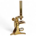 A good quality 19th century brass microscope, by A Ross of London, no. 260, brass lenses and