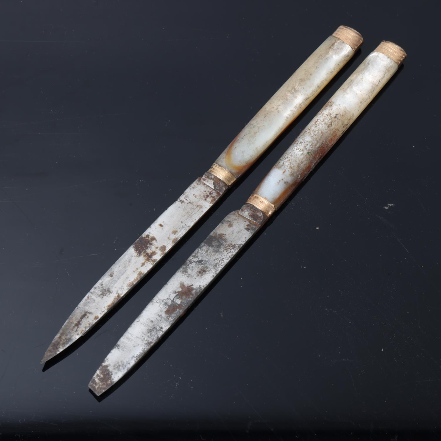 Pair of Georgian mother-of-pearl handled knives, with unmarked yellow metal mounts and steel blades, - Image 3 of 3