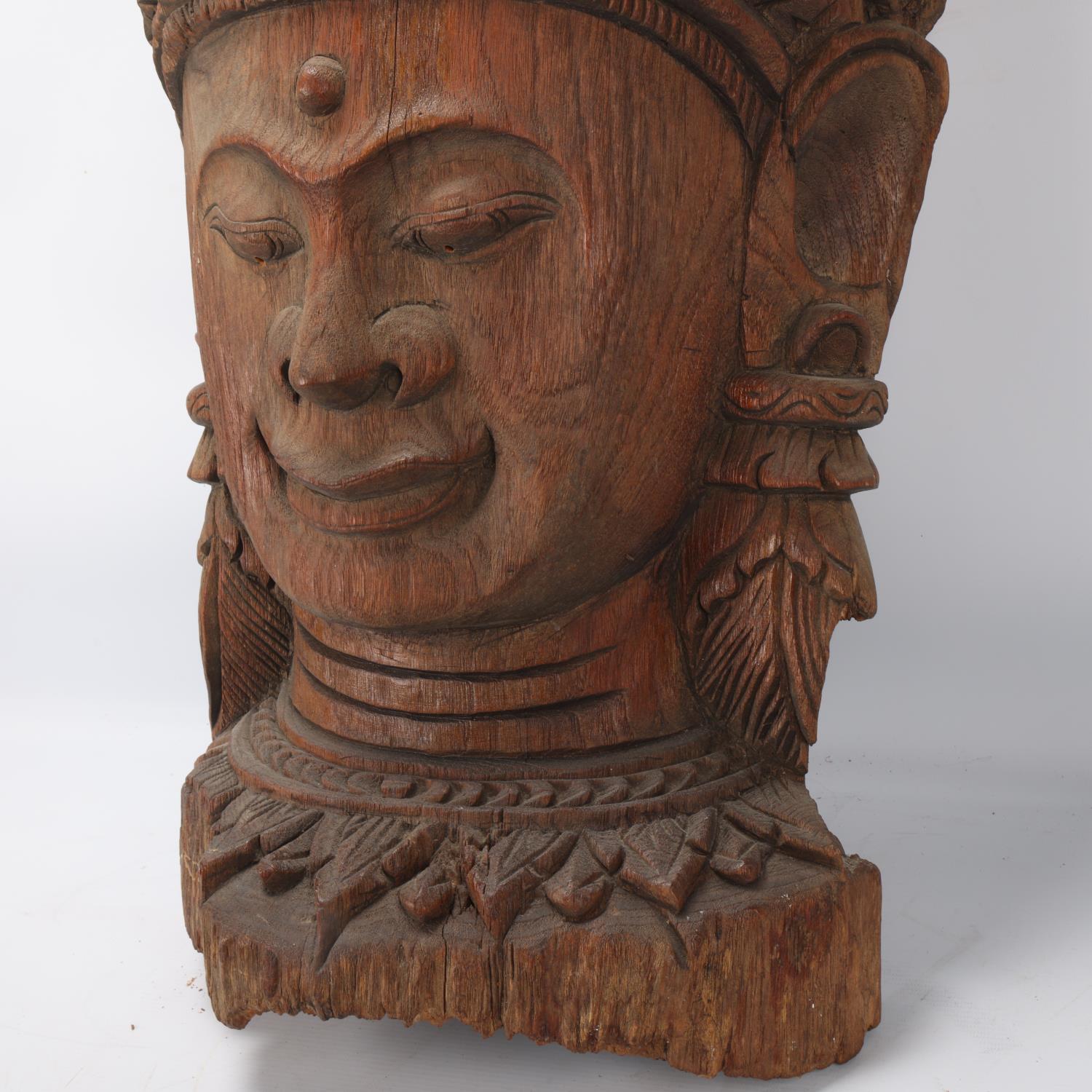 A large Burmese relief carved wood mask wall carving, height 67cm - Image 3 of 3