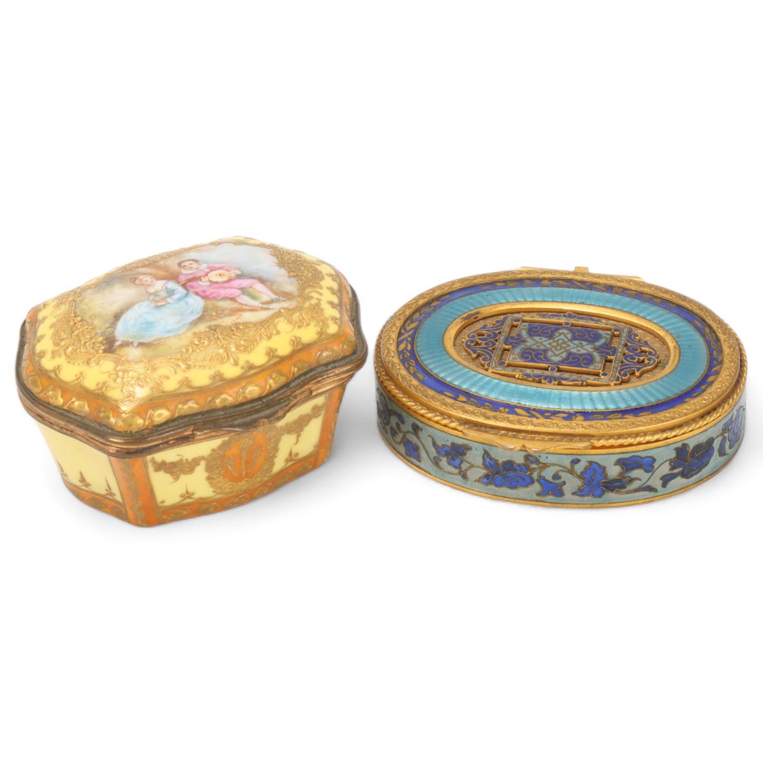 A French gilt-brass and enamel oval box, circa 1900, length 9cm, and a small French porcelain