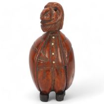 19th century coquilla nut box in the form of a figure, height 9cm Good condition