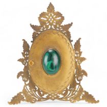 Ornate Victorian gilt-brass strut locket type double photo frame, pierced front with central