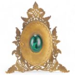 Ornate Victorian gilt-brass strut locket type double photo frame, pierced front with central