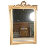 A 19th century gilt-gesso framed wall mirror, with floral wreath pediment, dimensions excluding