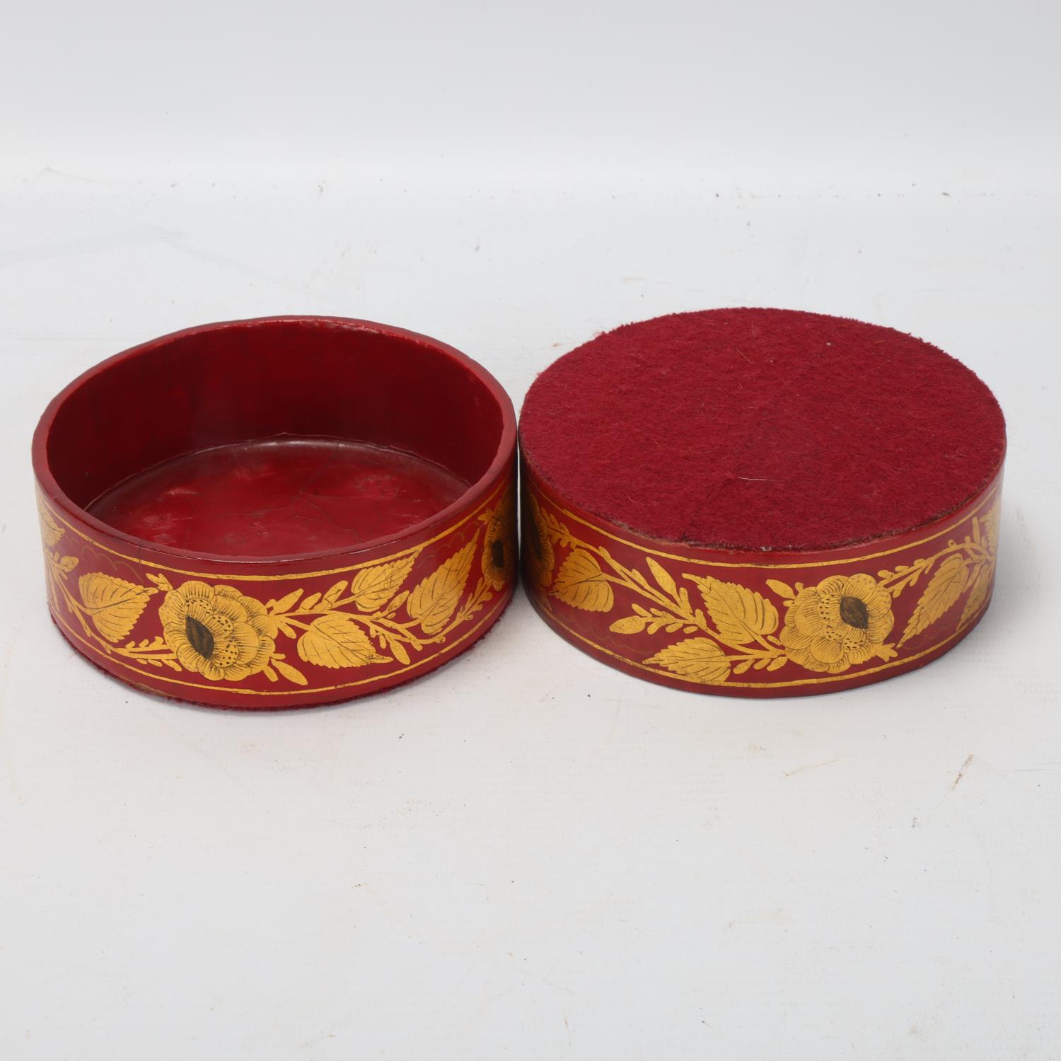 Pair of Regency red lacquer and hand painted gilt decorated papier mache wine bottle coasters, circa - Image 3 of 3