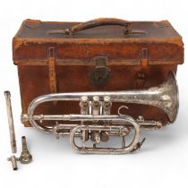 A silver plated cornet, by J Higham of Manchester, serial no. 61516, model Class A, length 34cm,